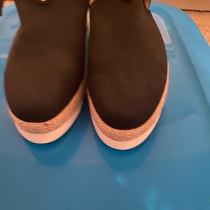 Women’s closed Toe ankle strap wedge sandals.